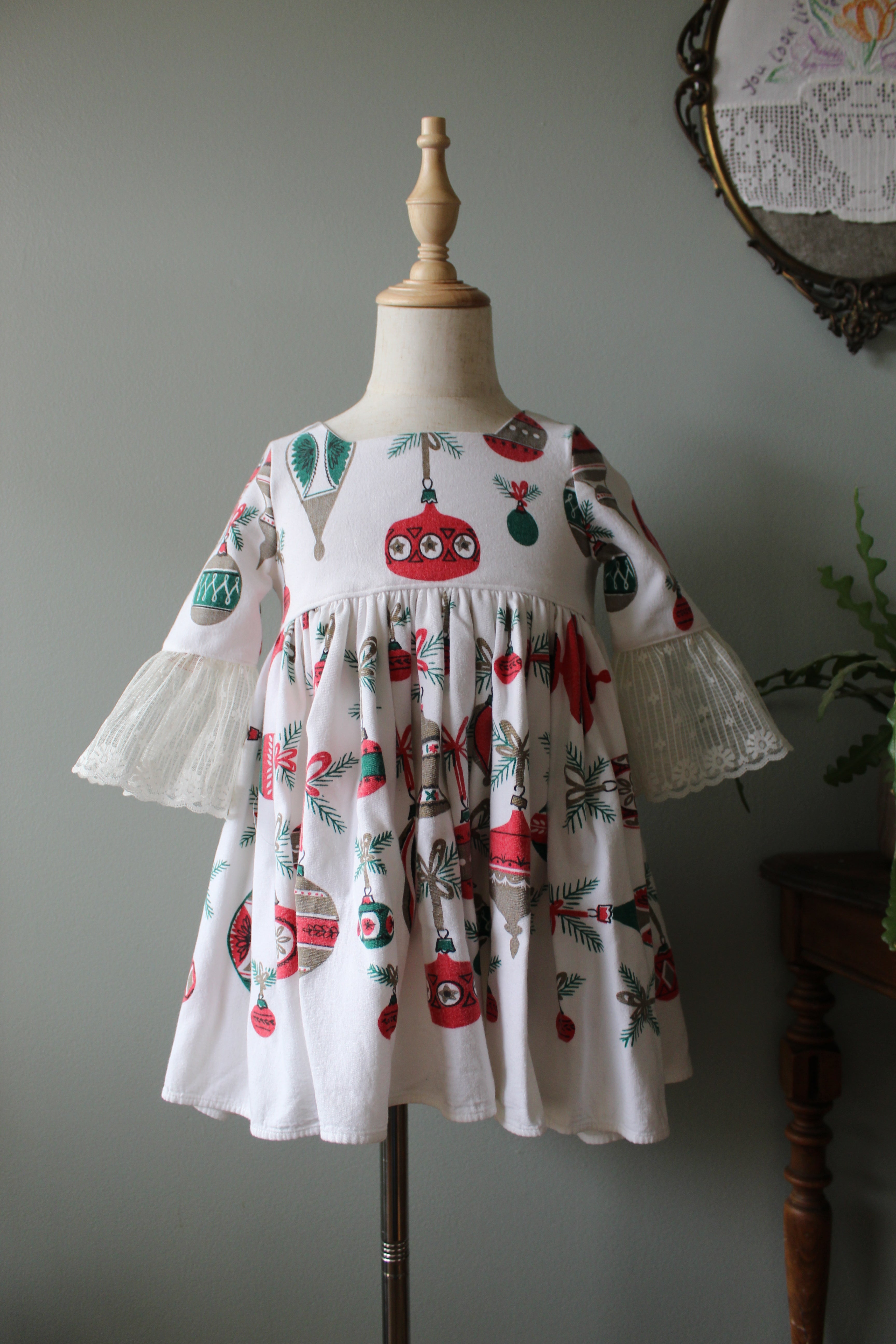 Toddler christmas dress made from vintage christmas tablecloth